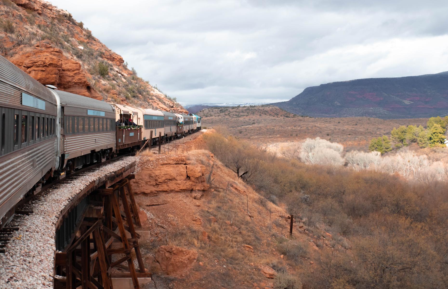 <p>There’s more than one spectacular canyon in Arizona, and you can ride a vintage train right down the spine of this one. Verde Canyon Railroad was built in 1912 to serve the area’s copper mines and has been transporting sightseers year-round since 1990.</p>  <p>Chasing the meanders of the Verde River, this four-hour round-trip takes passengers past Mars-red rock amphitheaters, historic ranch towns, kiwi-colored cacti, and the ancient ruins of Native American civilizations. Watch for bald eagles overhead as you chug along through the wilderness.</p>