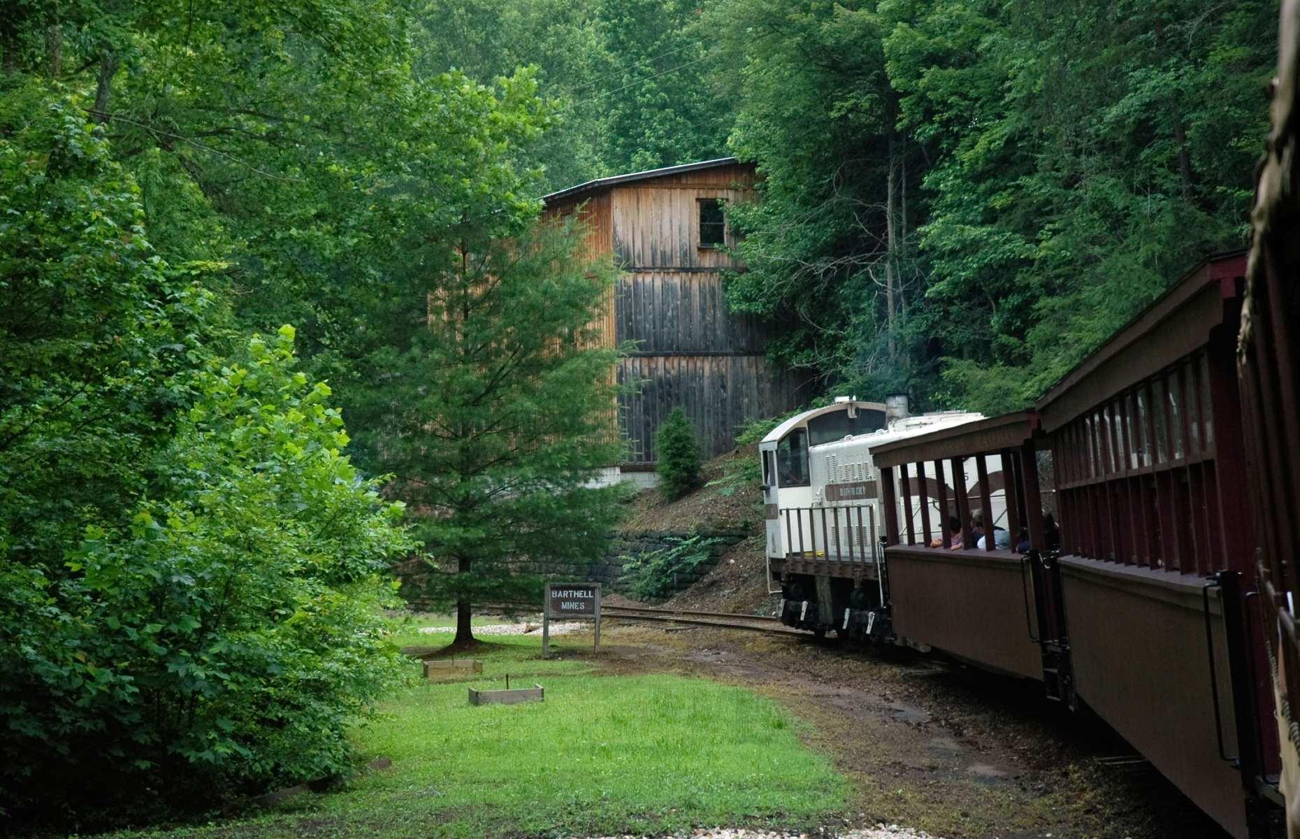<p>The Big South Fork Scenic Railway often finds itself high up lists of America's most delightful rail journeys, especially during leaf-peeping season. Perfect for nature lovers and history buffs, this round-trip adventure clanks along accompanied by views of the Daniel Boone National Forest and the Big South Fork River and Recreation Area.</p>  <p>This trip culminates in a two-hour layover at the Barthell Coal Camp where passengers can learn about life during the early 1900s in the southernmost Appalachians.</p>