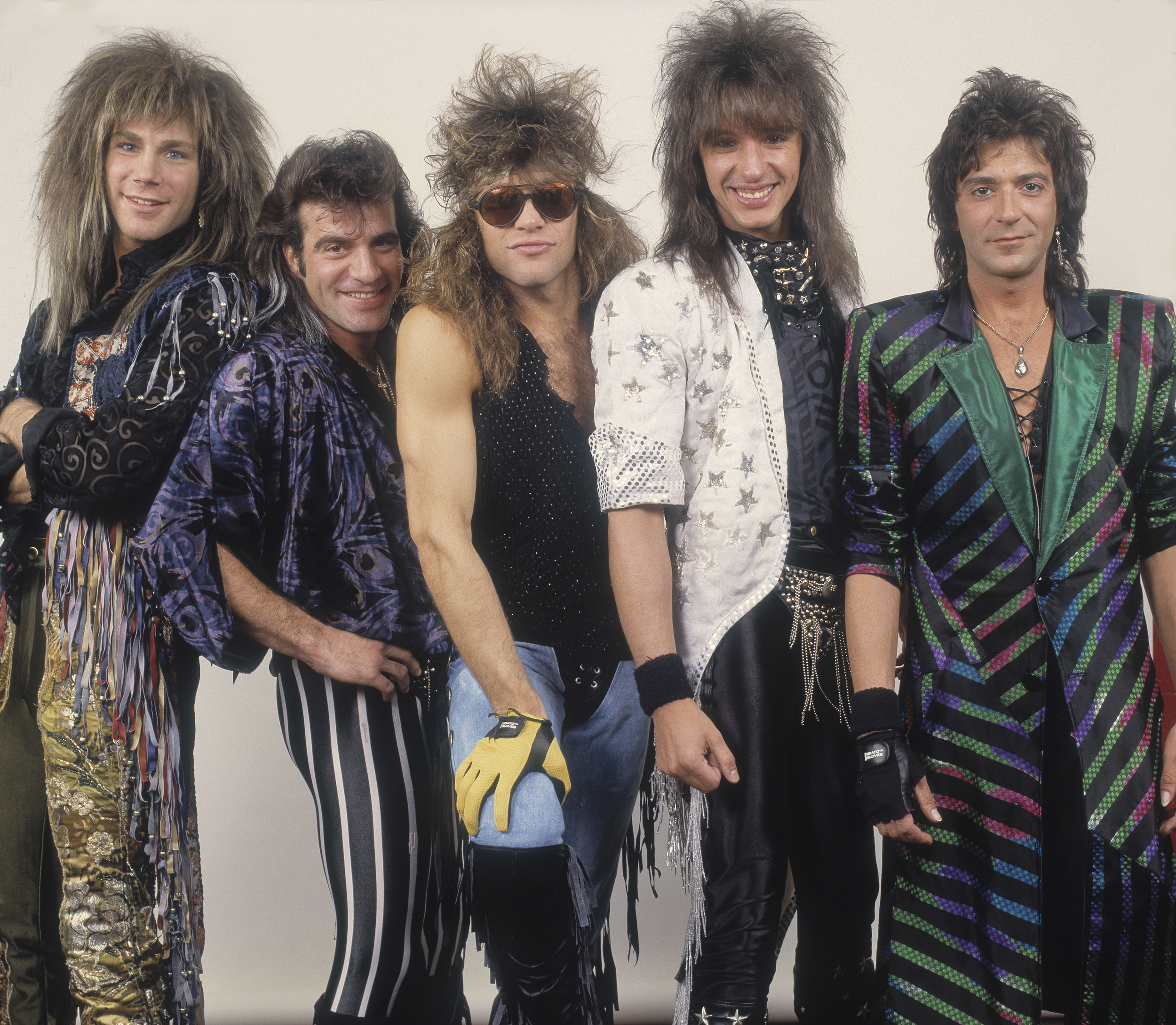 <p>Bon Jovi is another band that might be on the line when talking about whether it belongs in the hair metal category. We think it does, and if that's the case, it needs to be near the top of the list. Even in the <a href="https://www.youtube.com/watch?v=s86K-p089R8" rel="noopener noreferrer">"Runaway" </a>days of 1984, the hair was teased, and the stage coats were long. Of course, Bon Jovi was also a group made for MTV. Its songs perfectly combine arena rock and pop-metal, capturing a mainstream audience. The success of 1986's <em>Slippery When Wet</em>, featuring the <a href="https://www.youtube.com/watch?v=lDK9QqIzhwk" rel="noopener noreferrer">anthemic "Livin' on a Prayer,<span>"</span></a><span> made Bon Jovi one of the biggest acts in the world. More than anybody else on this list, it's been able to remain relevant and even earn induction into the Rock & Roll Hall of Fame.</span></p><p>You may also like: <a href='https://www.yardbarker.com/entertainment/articles/23_movies_that_highlight_why_1999_was_peak_cinema_122723/s1__39607288'>23 movies that highlight why 1999 was peak cinema</a></p>