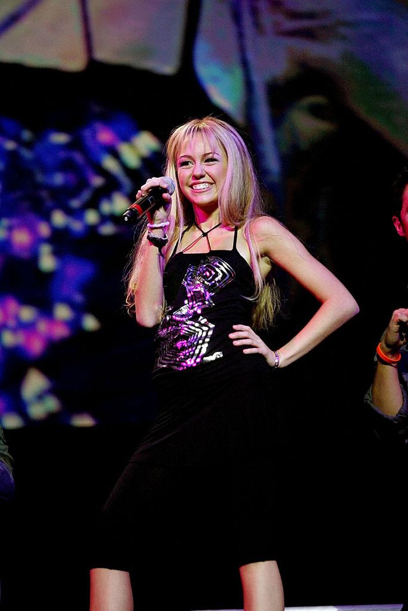 <p>Look how cute Miley was in her black tank and leggings! Wait, this was 13 years ago?! Now I feel old. </p>