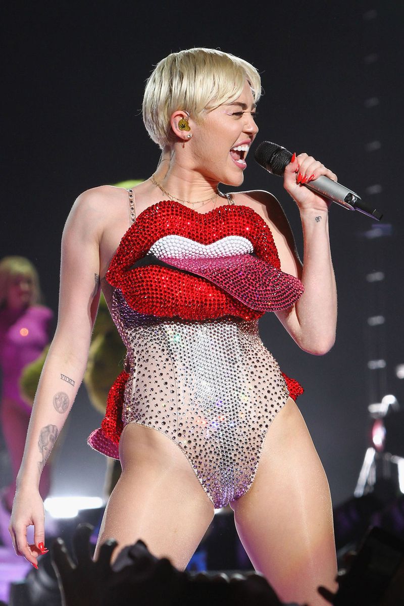 <p>Miley wore this rhinestone-covered one-piece with a huge three-dimensional pair of lips, which actually looks kind of amazing?! </p>