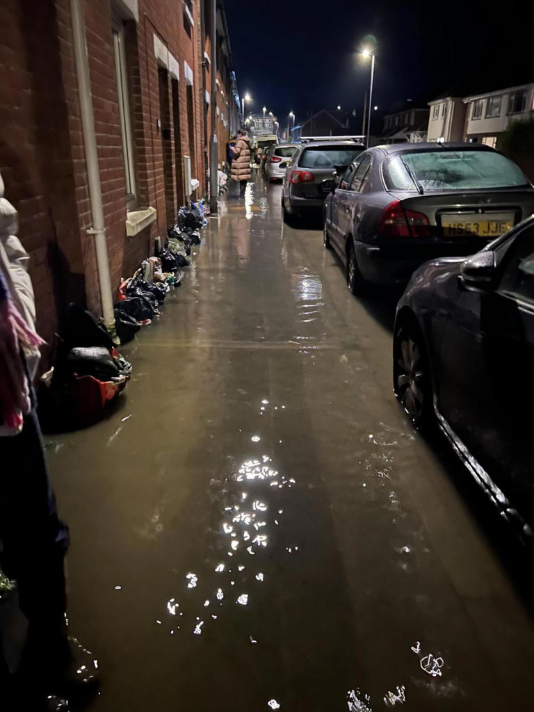 River bursts its banks forcing residents to evacuate their homes