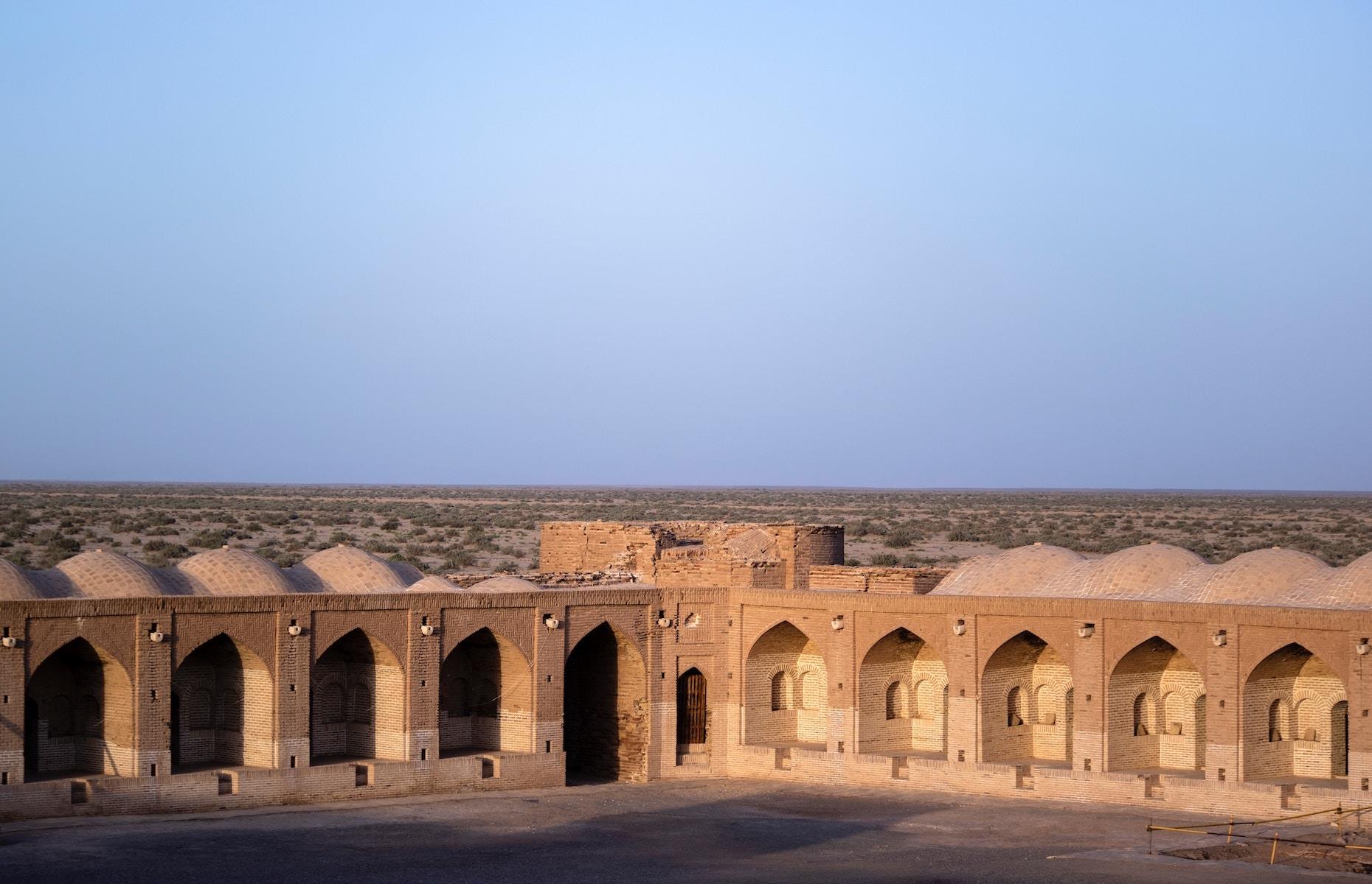 <p>This sprawling ancient inn, found in the centre of Kavir National Park in Qom province, was likely first constructed in the Sassanid era (AD 224–651) along the ancient trade route between Rey and Qom. Deir-e Gachin is one of many <em>caravansaries</em> that pepper the Iranian desert but it’s one of the largest and oldest. It was restored during the Safavid dynasty (16th-18th centuries) when <em>caravansaries</em> flourished along the Silk Road to provide refuge to travellers and traders. Centered around a huge courtyard, the vast structure includes a mosque, stone mill, bathhouse, prayer hall and two wells.</p>