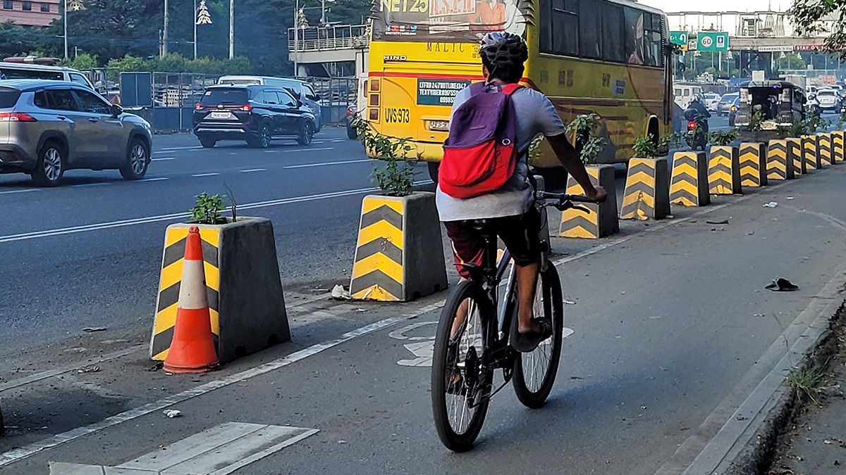 plant-box barriers, bike ramps, and more: a look at quezon city's bike-friendly initiatives