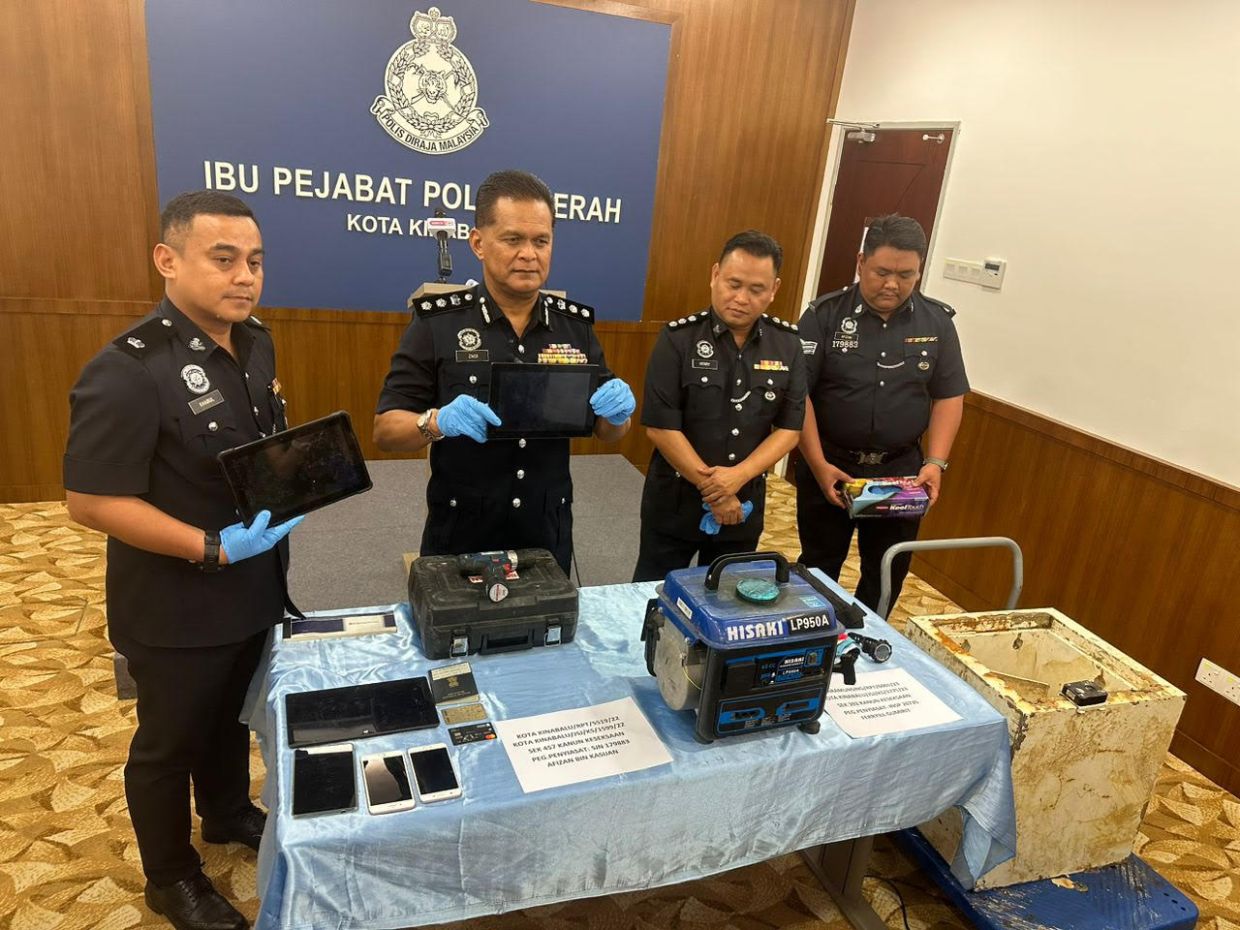 kk cops arrest two men over robberies including on chinese tourist