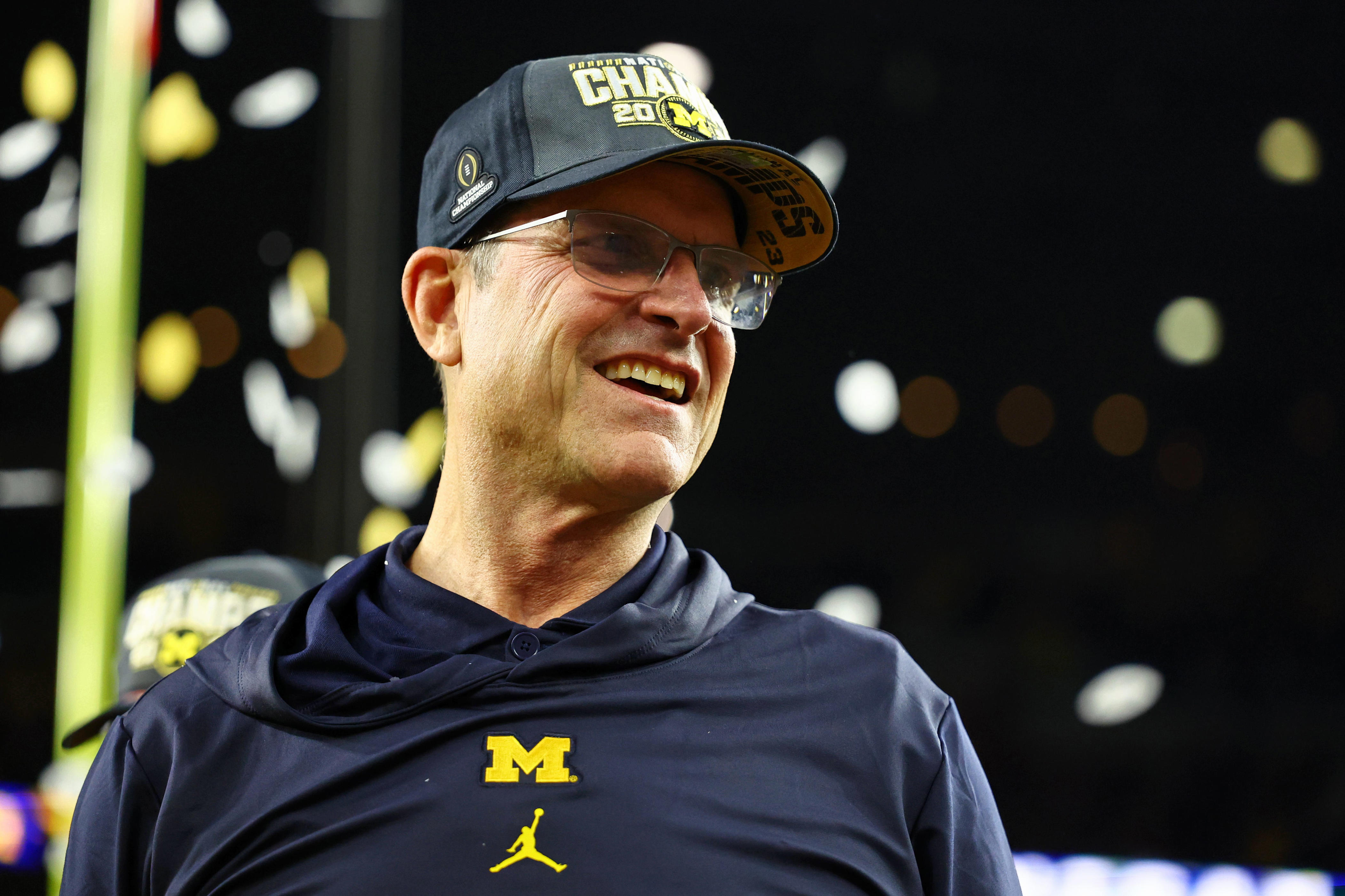 bonuses for college football coaches soar to new heights; harbaugh sets record with haul