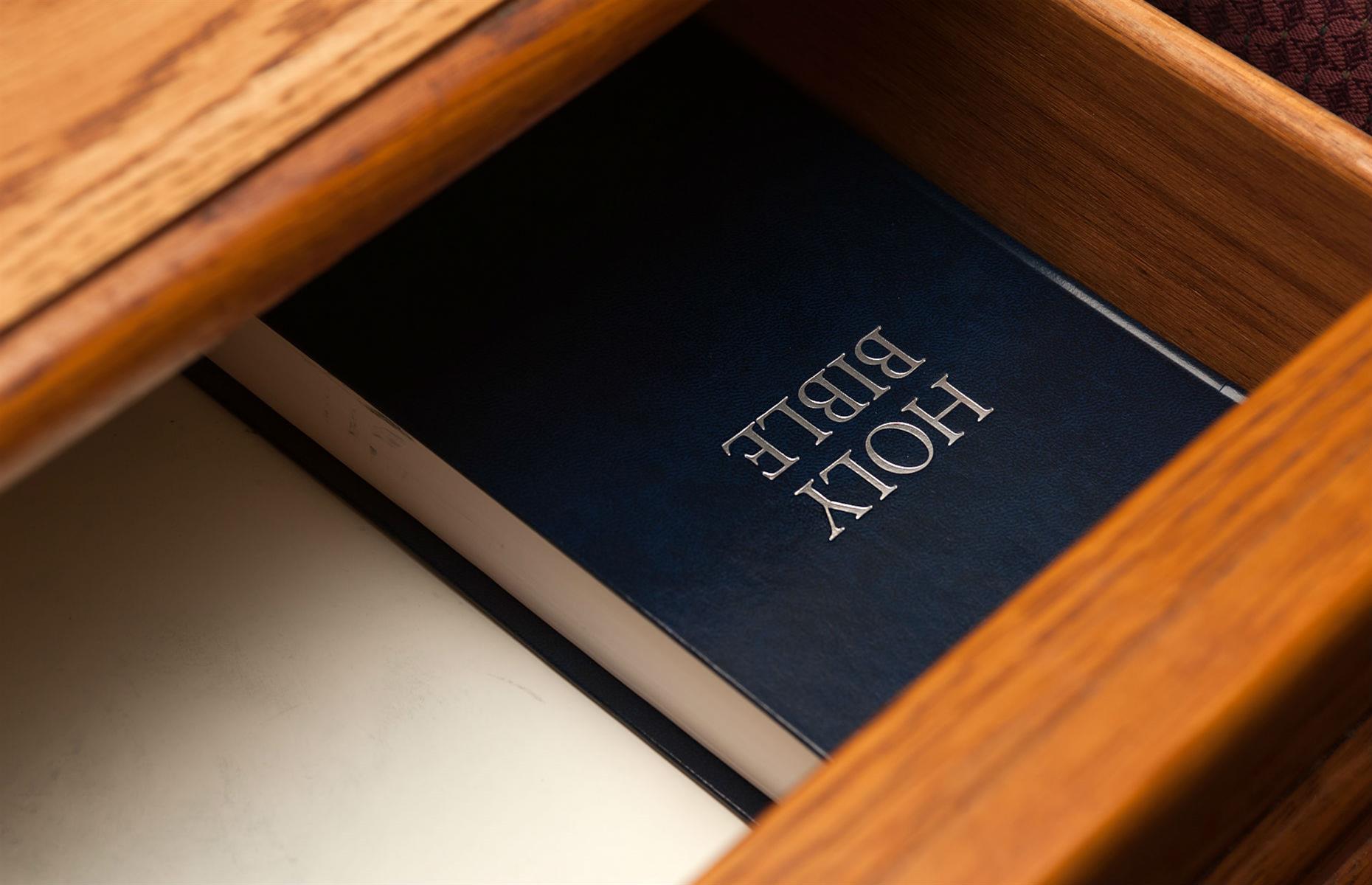 <p>The Bible you find in your bedside dresser has most likely been provided by The Gideons International, a Christian organization that expects their donation to have a six-year life span. In fact, the organization estimates that a quarter of travelers thumb through the Bible in their hotel room, so leave yours behind for the next guest. </p>  <p><strong><a href="https://www.loveexploring.com/galleries/137486/the-coolest-features-onboard-cruise-ships?page=1">Now discover the coolest features on board cruise ships</a></strong></p>