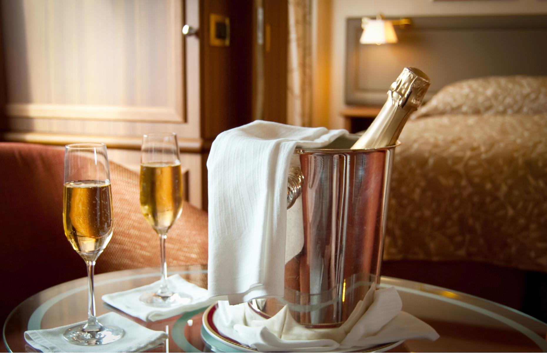 <p>As much as you may get attached to the Champagne flutes, cups or nice wine glasses in your hotel room (or on the plane), you can’t pop them in your bag to take home. These are things that you will definitely get fined or charged for.</p>
