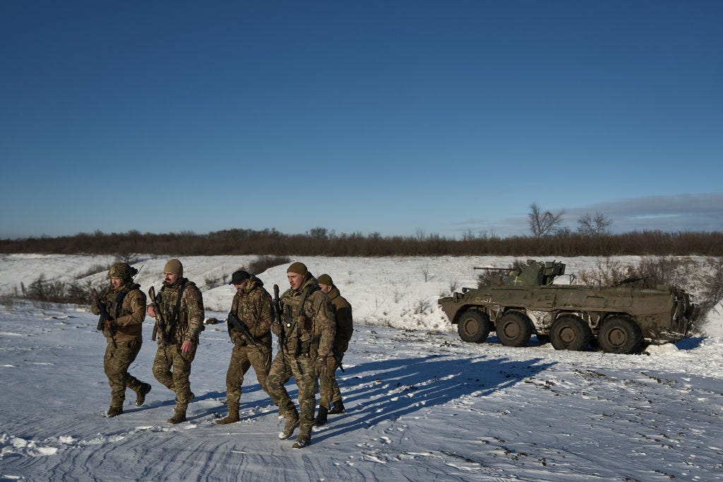 ukrainian soldiers say they're having to abandon vehicles and hike for miles to the front lines thanks to exploding russian drones