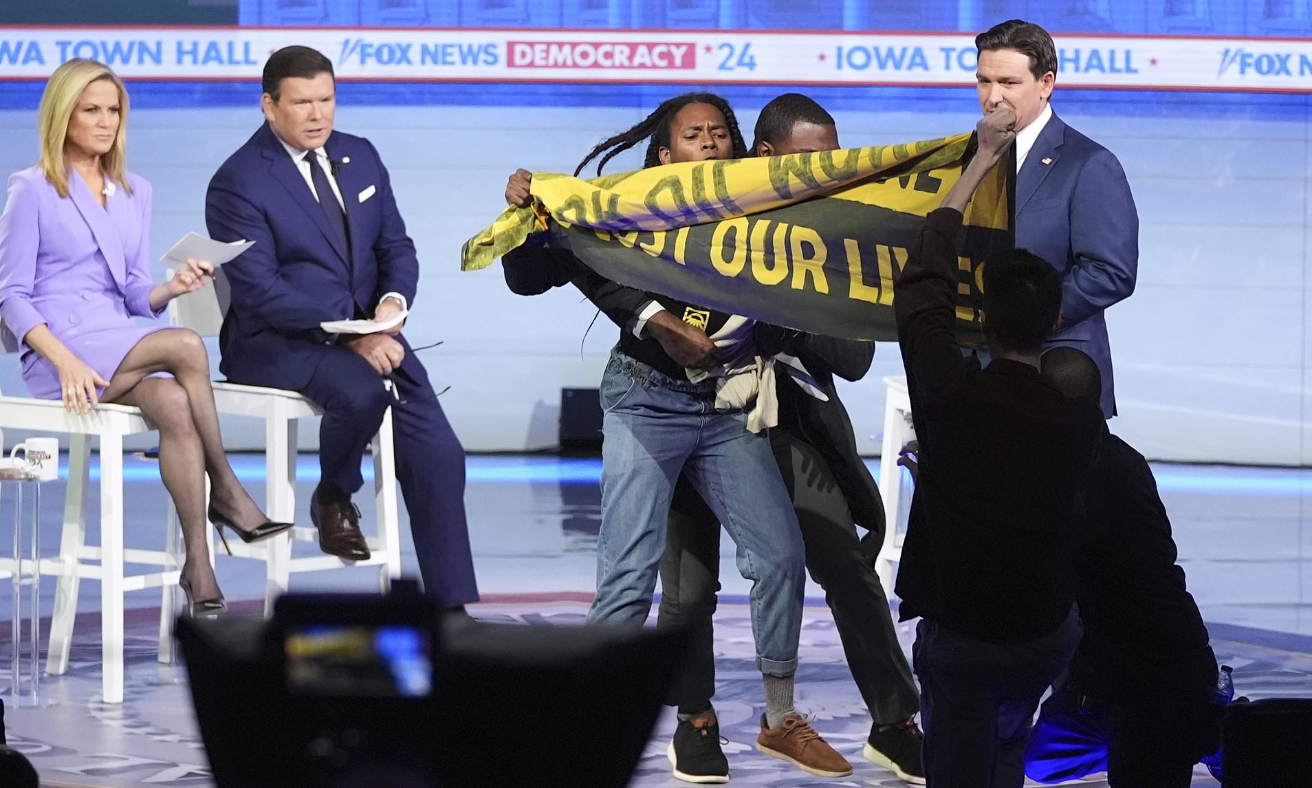 Protesters Chanting 'no Oil Money' Heckle Ron DeSantis: Chaos At Fox ...