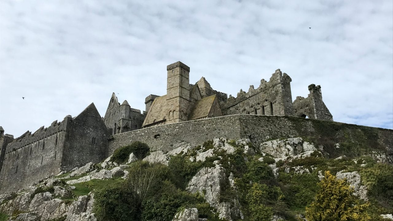 <p>Perched on a hill overlooking the Tipperary countryside and home of ancient Irish kings, the <a href="https://heritageireland.ie/places-to-visit/rock-of-cashel/" rel="nofollow noopener">Rock of Cashel</a> is one of the most historic spots on the island, with its oldest portion dating to roughly 1100. The town of Cashel, a picturesque 4,000-person hamlet, sits at the foot of the rock and includes several places to eat and shop for unique local crafts.</p>