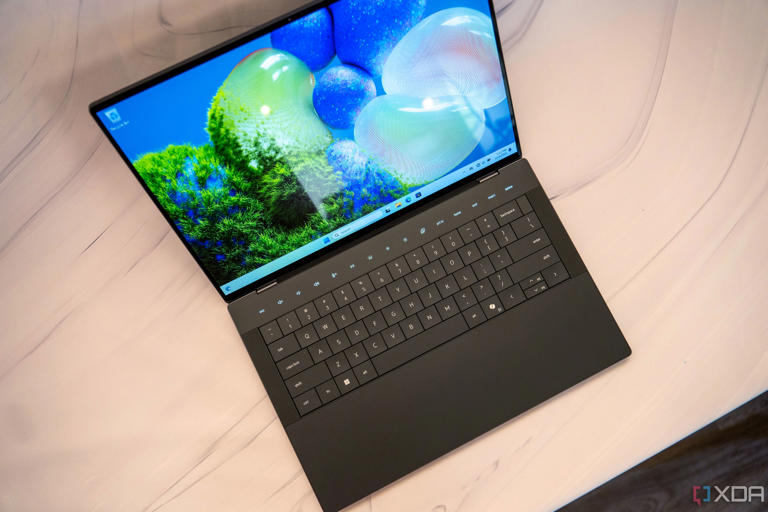 Dell XPS 14 (2024) vs Lenovo Yoga 9i (2024) Should you go clamshell or