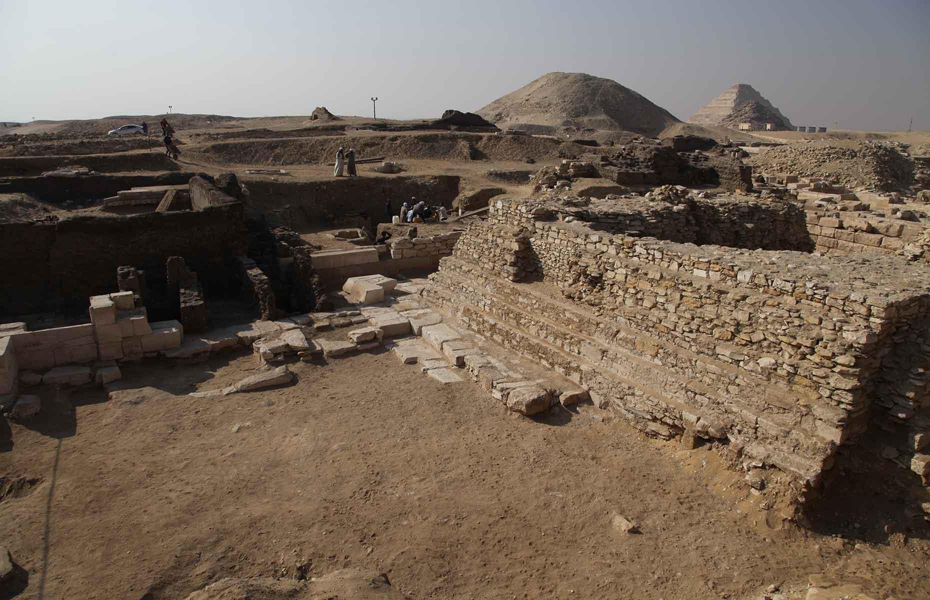 <p>At the same excavations, archaeologists also uncovered the pyramid of a previously unknown Egyptian queen named Neith. Pictured here is the excavated site, with the Teti and Djoser pyramids visible in the background. Neith was likely named after the Egyptian goddess of creation, wisdom, weaving and war, as well as being worshipped as a funerary goddess.</p>