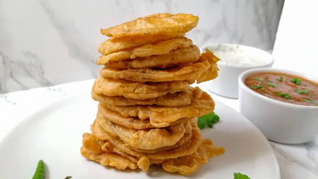 <p>These deep-fried potato slices in a spicy gram flour batter will have you reaching for more. Fluffy inside with a crispy outer shell, Aloo Pakoras will become your new favorite tea-time snack. <a href="https://soyummyrecipes.com/potato-pakora-aloo-pakora/">Get the recipe.</a></p>