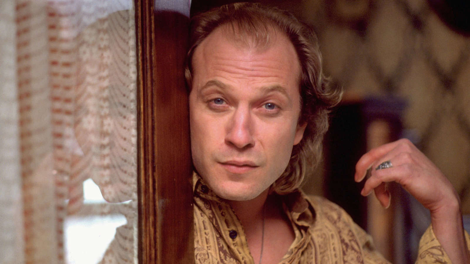 <p>"Goodbye Horses" in <em>The Silence of the Lambs</em> is that audacious needle drop that makes you question your own sanity while admiring its brilliance. When Buffalo Bill, the creepiest villain in cinematic history, starts shimmying in front of a mirror, you'd think you've wandered into a David Lynch nightmare. But then, the haunting, ethereal notes of Q Lazzarus's song slither in, turning this grotesque scene into a surreal ballet of darkness.</p>