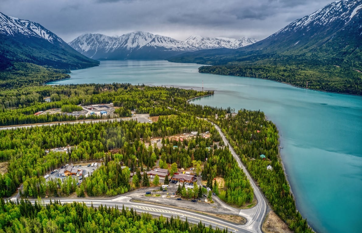<p><strong>Population:</strong> <a href="https://data.census.gov/profile/Cooper_Landing_CDP,_Alaska?g=160XX00US0217190" rel="noopener">340</a> as of 2022</p> <p>If you like boating, rafting, fishing or hiking, then you’ll love Cooper Landing, which is about 105 miles south of Anchorage. Dwarfed by the Kenai Mountains and overlooking the turquoise-colored Kenai River, “The Landing” gets very busy each summer as day-trippers head down to play in the water, hike gorgeous trails in the Chugach National Forest and watch grizzly bears prowl for salmon leavings. The rest of the year, things are fairly quiet.</p> <p>A senior housing complex is available, and the <a href="https://cooperlandingchamber.com/listing/cooper-landing-senior-citizens-corporation-inc/" rel="noopener">Cooper Landing Senior Citizen Corp.</a> provides bus transportation to Soldotna and Kenai for shopping and medical appointments. Soldotna also has a hospital; if your situation is serious, you might be sent up to Anchorage.</p> <p>Visitors and residents alike appreciate the adorable <a href="https://cooperlandinglibrary.com/" rel="noopener">Cooper Landing Library</a>, which is located in a log cabin. The closest movie theater is in Kenai, which is 50 miles away, but you might catch a return performance by the moose that walked in to <a href="https://www.alaskasnewssource.com/2023/04/22/watch-moose-fills-up-popcorn-kenai-theater/" rel="noopener">swipe some popcorn</a> back in April 2023.</p> <p>Join 1.2 million Americans saving an average of $991.20 with Money Talks News. <a href="https://www.moneytalksnews.com/?utm_source=msn&utm_medium=feed&utm_campaign=one-liner#newsletter">Sign up for our FREE newsletter today.</a></p> <h3>Sponsored: Find a vetted financial advisor</h3> <ol> <li>Finding a fiduciary financial advisor doesn’t have to be hard. <a rel="sponsored noopener" href="https://www.moneytalksnews.com/out/aff_c?offer_id=33&aff_id=1000&ref=https%3A%2F%2Fwww.msn.com%2Fslideshows%2Fthe-best-places-to-retire-in-alaska%2F">In five minutes, SmartAsset's free tool matches you with up to 3 financial advisors serving your area.</a></li> <li>Each advisor has been vetted by SmartAsset and is held to a fiduciary standard to act in your best interests. <a rel="sponsored noopener" href="https://www.moneytalksnews.com/out/aff_c?offer_id=33&aff_id=1000&ref=https%3A%2F%2Fwww.msn.com%2Fslideshows%2Fthe-best-places-to-retire-in-alaska%2F">Get on the path toward achieving your financial goals!</a></li> </ol> <p class="disclosure"><em>Advertising Disclosure: When you buy something by clicking links on our site, we may earn a small commission, but it never affects the products or services we recommend.</em></p>