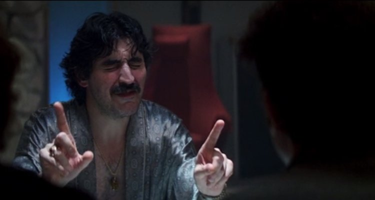 <p>"Jessie's Girl" by Rick Springfield in "Boogie Nights" is the groovy backdrop to chaos, the disco inferno that ignites a drug deal gone delightfully wrong. Alfred Molina's manic air-drumming to this pop gem is like a bizarre prelude to the impending madness. As the catchy beats of "Jessie's Girl" fill the room, you can't help but groove along with a surreal sense of impending doom. It's a perfect needle drop that encapsulates the film's rollercoaster of decadence and despair. As Dirk Diggler watches in wide-eyed horror, you realize that sometimes the most unforgettable moments happen when the music clashes with the mayhem.</p>