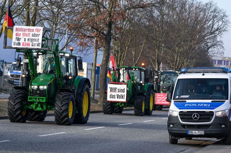 Scholz Greeted By Farmers Protesting Diesel Tax Plan