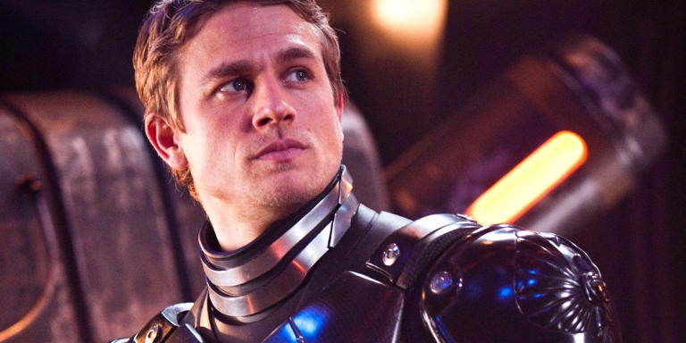 Charlie Hunnam as Raleigh Becket smiling in a scene from Pacific Rim.