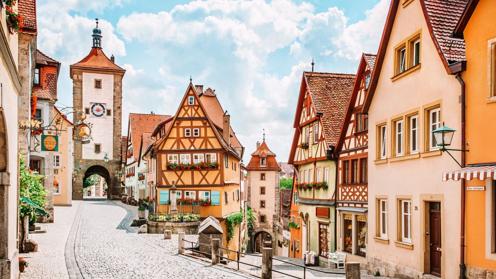 <p>Colorful, Instagrammable Bavarian architecture makes the Franconian town of Rothenburg ob der Tauber stand out. This German destination is made for winter, with the Christmas Reiterlesmarkt, convivial taverns, and snowy rooftops. You can enjoy the timeless atmosphere and well-preserved medieval architecture at any time of year. </p><ul> <li>Read also: <a href="https://worldwildschooling.com/europe/germany/">Germany Travel Guide</a></li> </ul>