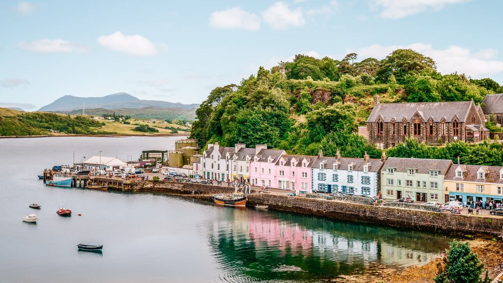 <p>The capital of the Isle of Skye in Scotland’s Inner Hebrides is super pretty and surrounded by unspoiled coastline and countryside. Expect colorful buildings lining the harbor, plus lovely boutiques, pubs, and places to eat.</p><ul> <li>Read also: <a href="https://worldwildschooling.com/europe/uk/">Best Places to Visit in The UK</a></li> </ul>