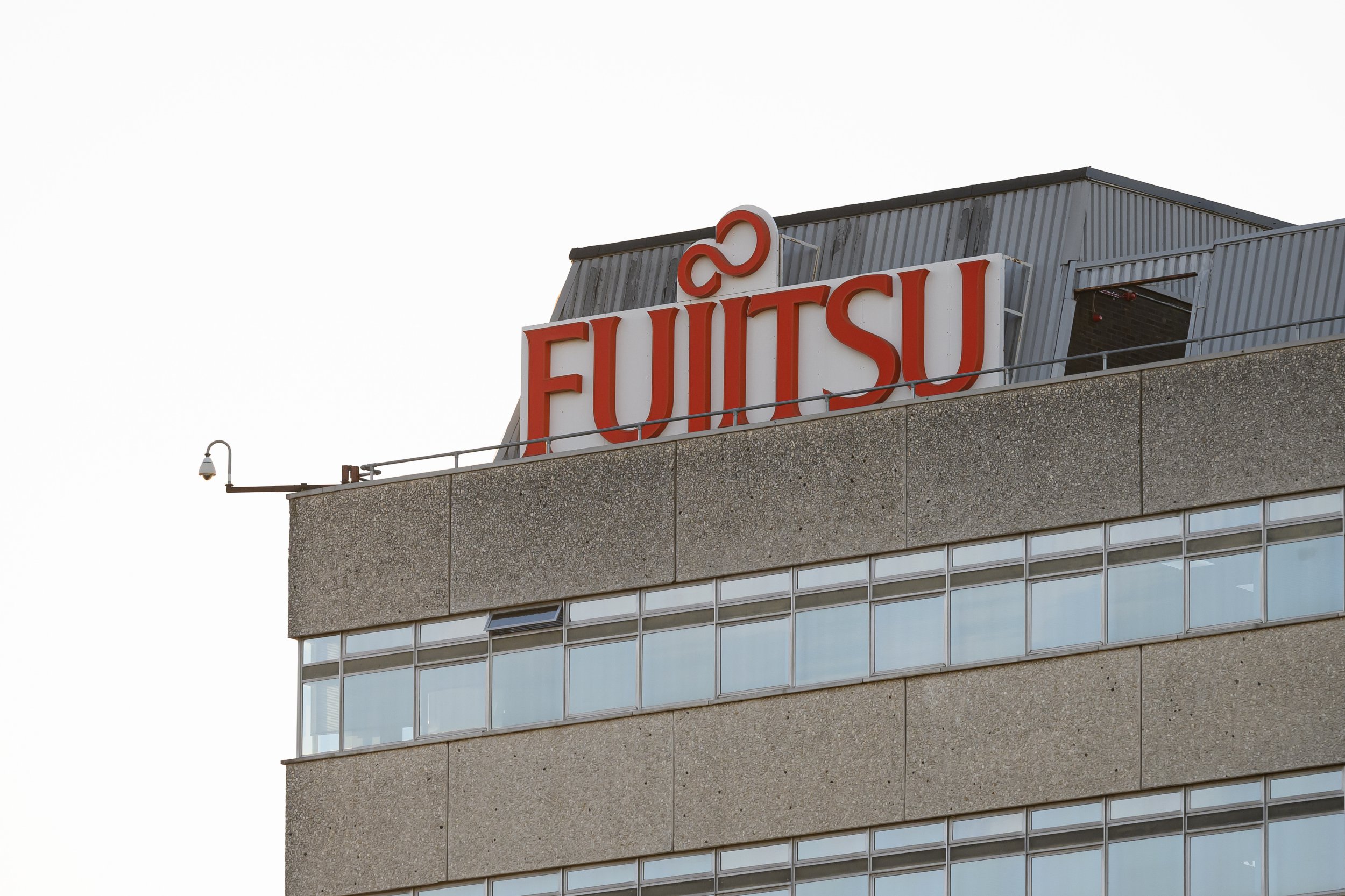 fujitsu has taxpayer-funded official to help it secure government contracts