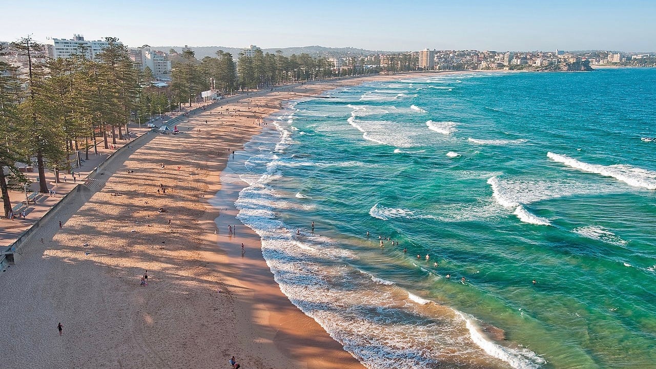 <p>Spend a relaxing day at Manly Beach. Whether surfing, swimming, or enjoying the sun, Manly offers a laid-back atmosphere with plenty of shops and eateries to explore. Located on Sydney’s North Shore, you can take a ferry or train—though I think the ferry is more fun.</p>