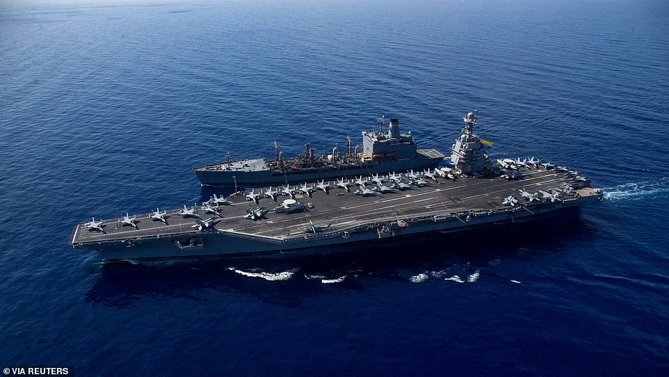 Incredible photos show Beijing building a fake armada of US warships