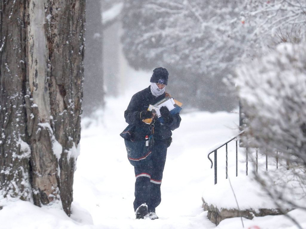 Postal workers trudge through snow, sleet and subzero temps to deliver