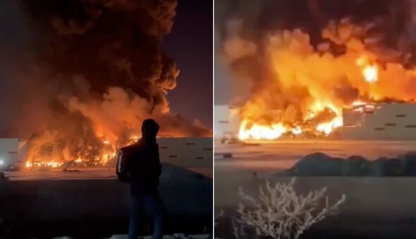 putin faces fresh revolt as fed-up russians burn down 25-acre warehouse in fury at war