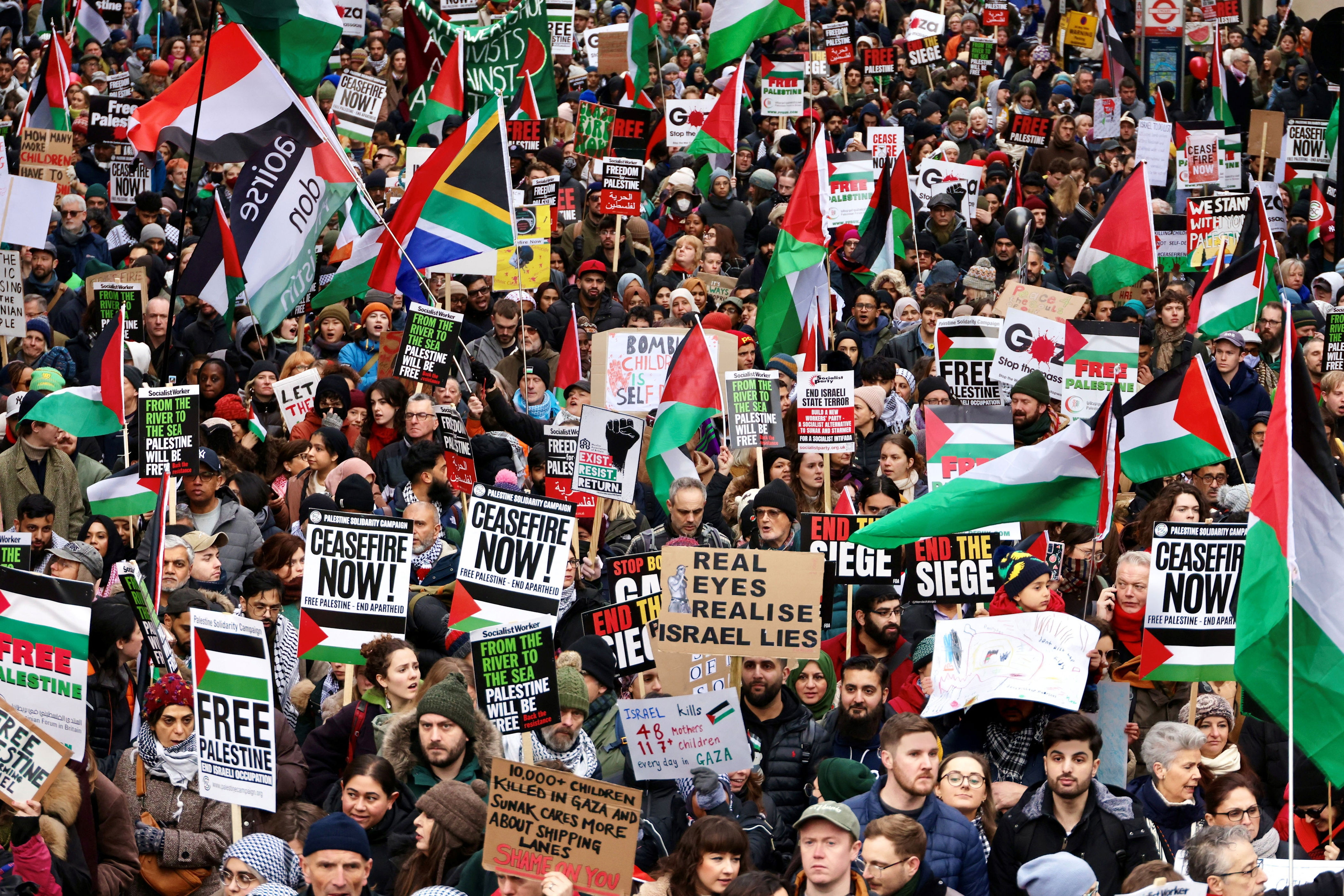 thousands attend pro-palestine protest as police warn of crackdown on slogans