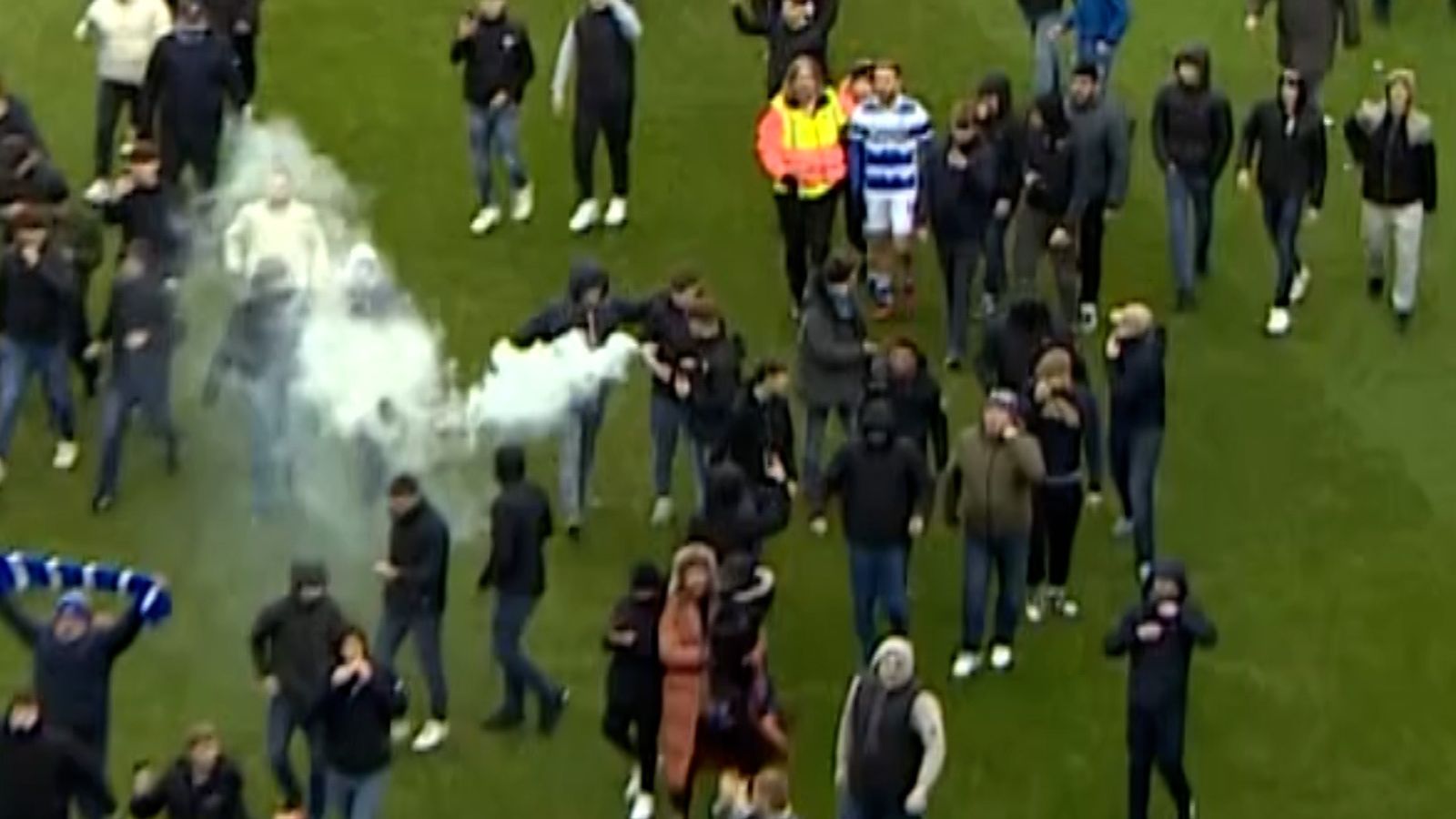 Football Match Abandoned After Fans Invade Pitch