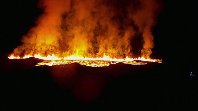 Lava spewing into the air as volcano erupts in southwest Iceland
