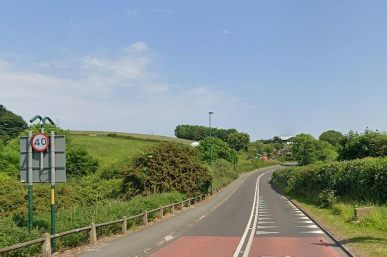 Car left on its side after crash near Loftus as person taken to