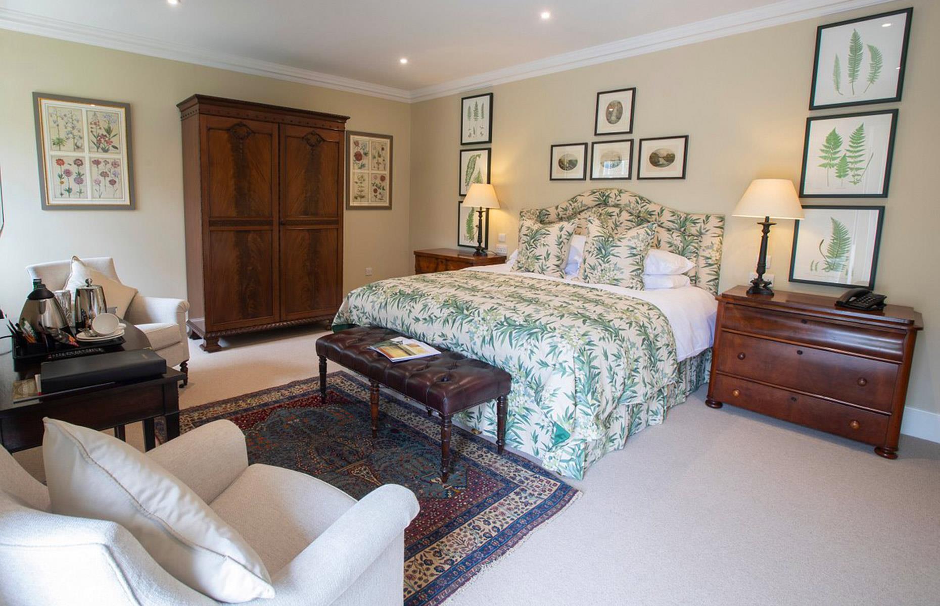 <p>Officially opened by King Charles in 2019, the former granary has been converted into a 10-bedroom bed and breakfast, nestled between the castle and the shore. The luxurious property, which contains this elegant bedroom, costs around <a href="http://hotels.cloudbeds.com/reservation/ZpuqD2#checkin=2024-08-12&checkout=2024-08-19">£2,000 ($2.5k)</a> for seven nights in August.</p>  <p>Offering views out across the Pentland Firth towards Orkney, visitors can enjoy spectacular sunsets and, if they’re lucky, views of the Northern Lights.</p>