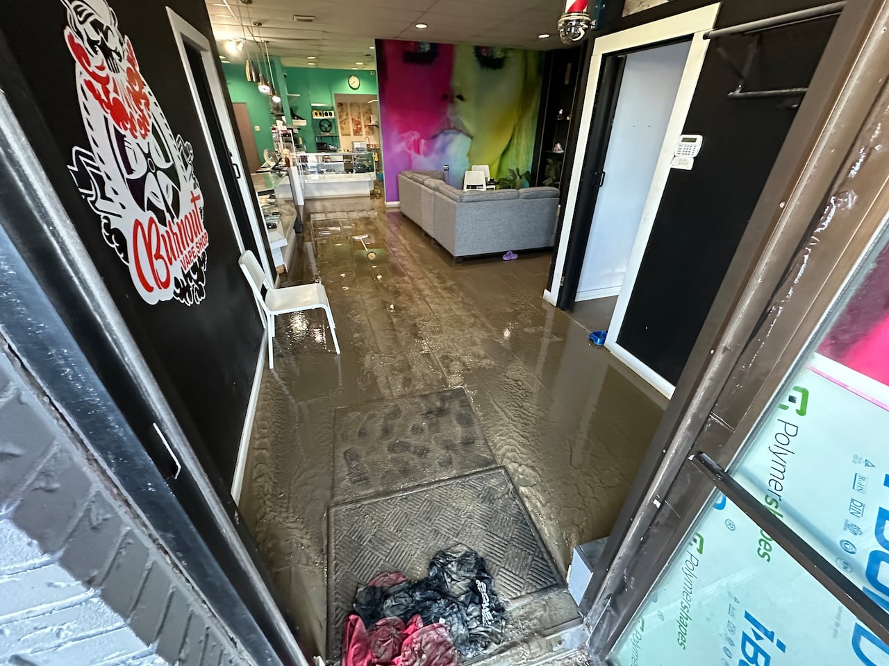 water main break floods mcphillips street businesses amid extreme cold warning
