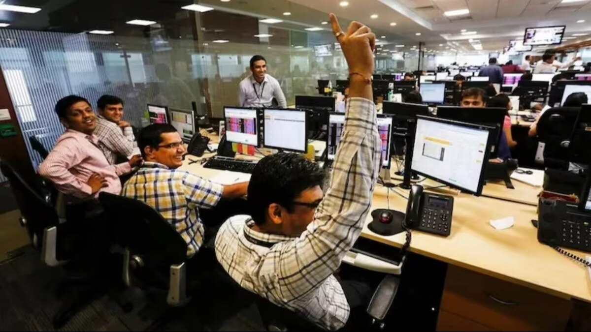 sensex hits record high, nifty crosses 22,000 as it rally continues