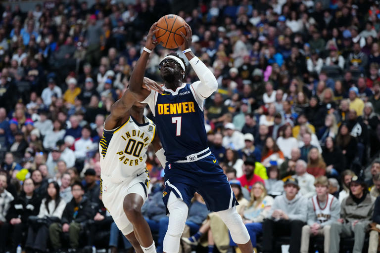 Nikola Jokic and defending champion Nuggets outlast short-handed Pacers