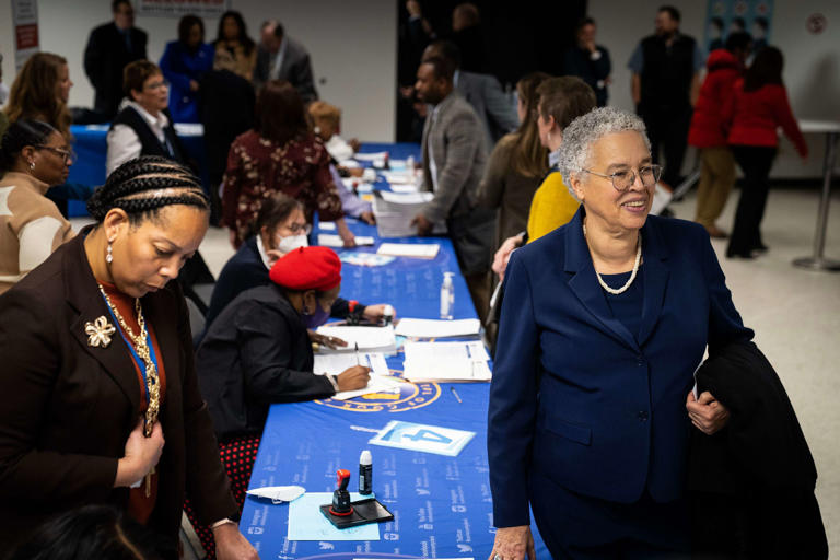 Cook County Board President Toni Preckwinkle, right, files petitions on Nov. 27, 2023, to appear on the primary election ballots.