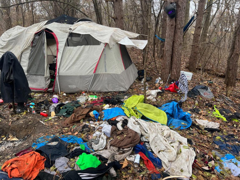 Volunteers clean up homeless camp debris near Kalamazoo