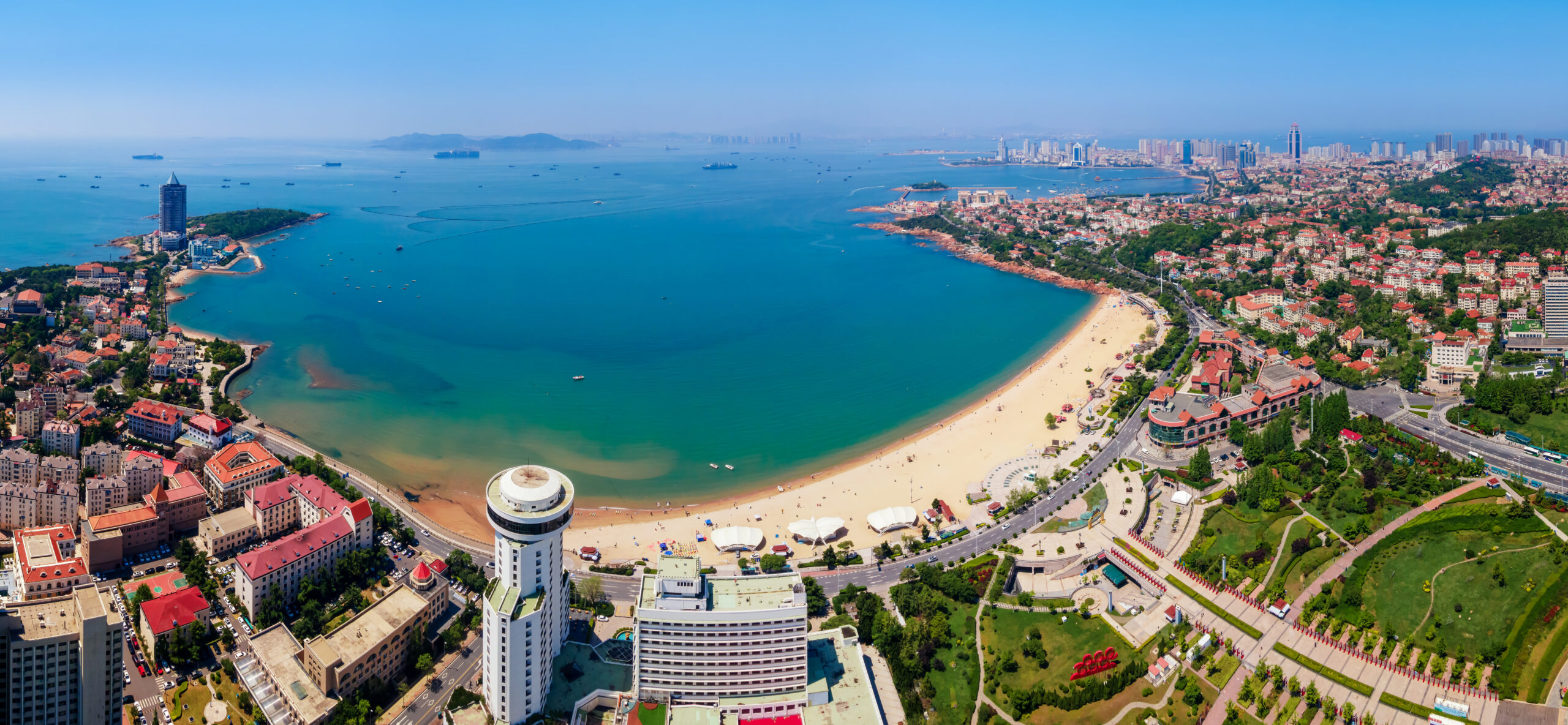 <p>Qingdao Huiquan Beach is located in Qingdao, China. Checking out the beaches of China might sound like a dreamy adventure, but this particular beach is way too crowded to be much fun for anyone. Around 130,000 people make their way over to Qingdao Huiquan Beach every single day.</p> <p>Since the beach is so close to the city, the proximity is one of the main reasons it’s so popular. It’s also totally free to visit this beach without any admission fees. People trying to save money while enjoying themselves will typically consider Qingdao Huiquan Beach to be a prime vacation destination. It’s not worth your time if you don’t have enough space to lay a beach towel down.</p>