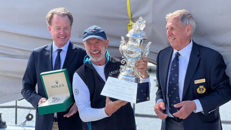 Alive skipper Duncan Hine celebrates overall honours in the 2023 Sydney to Hobart Yacht Race. (ABC News: Chris Rowbottom)