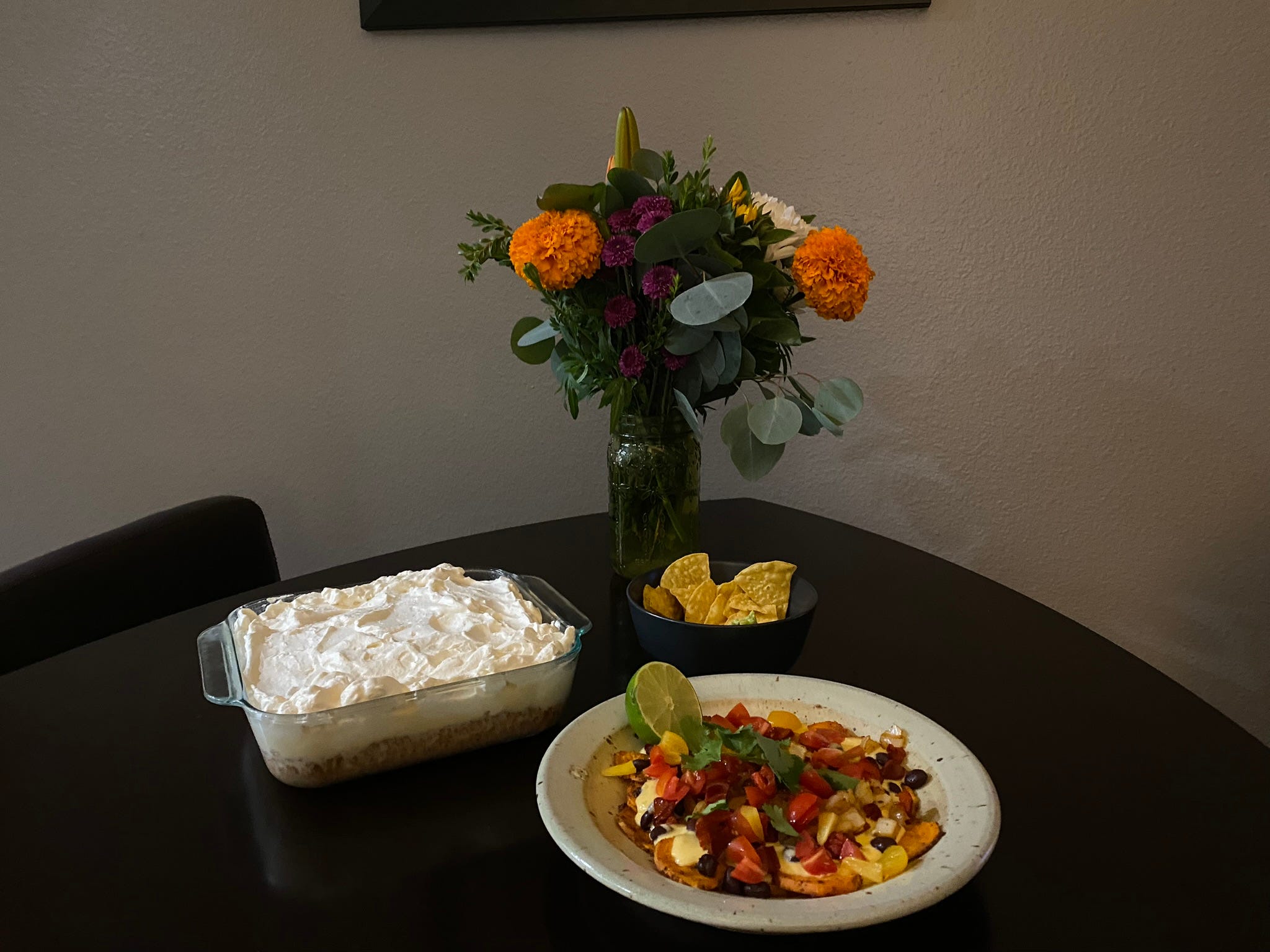 <p>For day two, I was relieved that my tres leches cake was already mostly prepped in the fridge.</p><p>I went with a simple appetizer of <a href="https://www.insider.com/which-brand-tortilla-chips-should-i-get-at-store-ranking-review">fresh guacamole</a> and tortilla chips and a veggie-packed dinner of sweet-potato "nachos."</p><p>I didn't feel like making a big dinner when the time to cook came around, and this is normally a time when I'd just make something fast, like grilled cheese, or order something from a restaurant.</p><p>But I pushed through and was glad I did because the entire meal tasted great.</p><p>Yet again, I had a lot of dishes to clean up at the end of the day but I tried to find some gratitude that I could make such a tasty, veggie-packed meal on a busy Monday.</p>