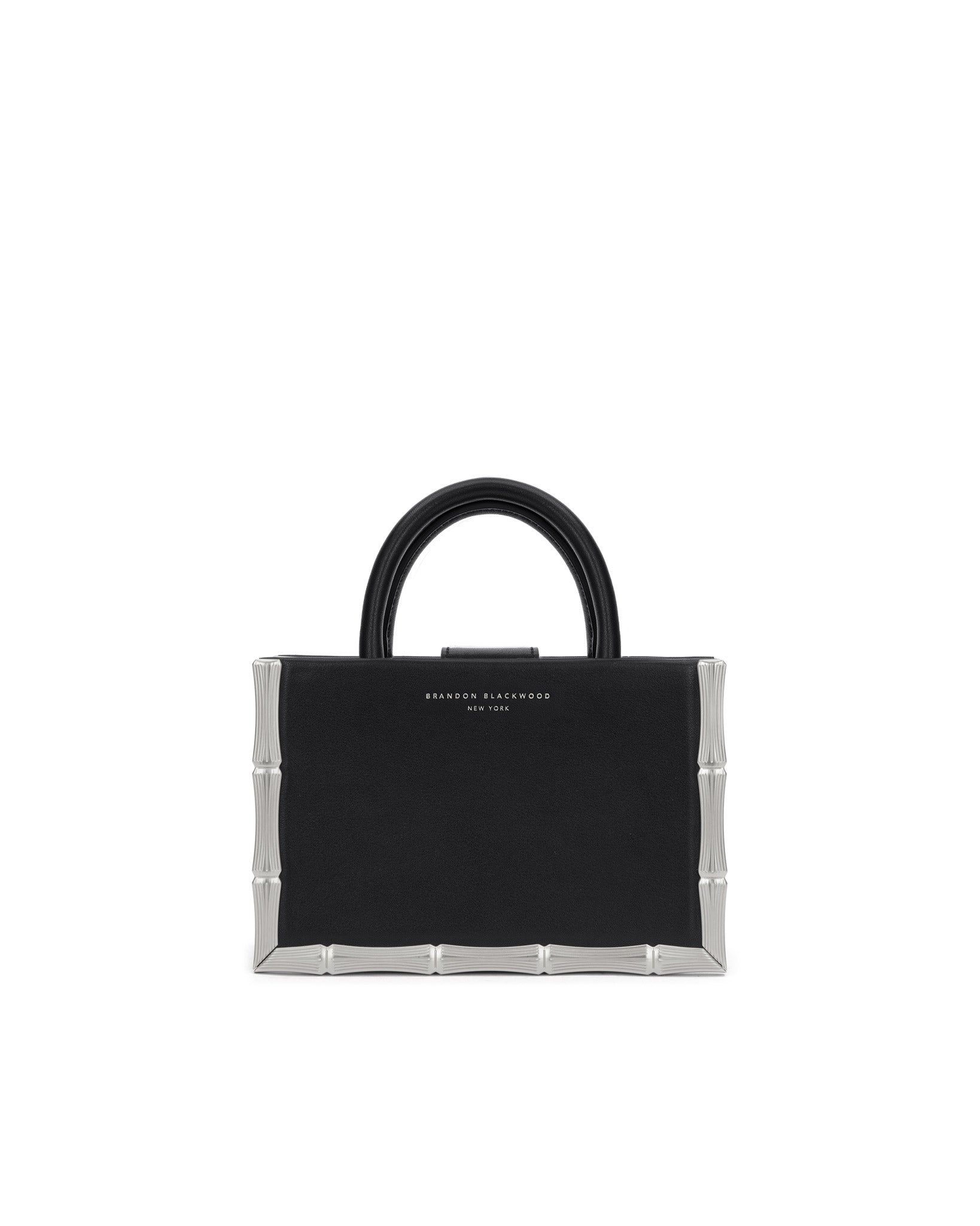 <p><strong>$280.00</strong></p><p><a href="https://brandonblackwood.com/products/bamboo-b-tote-black-leather-silver-hardware">Shop Now</a></p><p>Embellished, but not over-the-top: Brandon Blackwood’s signature boxy tote is a lesson in balance. The double handles add a ladylike quality, whether you carry it with a jeans-and-tee outfit or a slinky <a href="https://go.redirectingat.com?id=74968X1553576&url=https%3A%2F%2Fwww.harpersbazaar.com%2Ffashion%2Ftrends%2Fg41760461%2Fbest-black-tie-wedding-guest-dresses%2F&sref=https%3A%2F%2Fwww.veranda.com%2Fluxury-lifestyle%2Fluxury-fashion-jewelry%2Fg46245229%2Fbest-designer-tote-bags%2F">black-tie gown</a>. There’s also a removable strap for easy crossbody carrying.</p><p><strong>Colors: </strong>Black/silver, black/gold</p><p><strong>Materials:</strong> Leather, hardware</p>