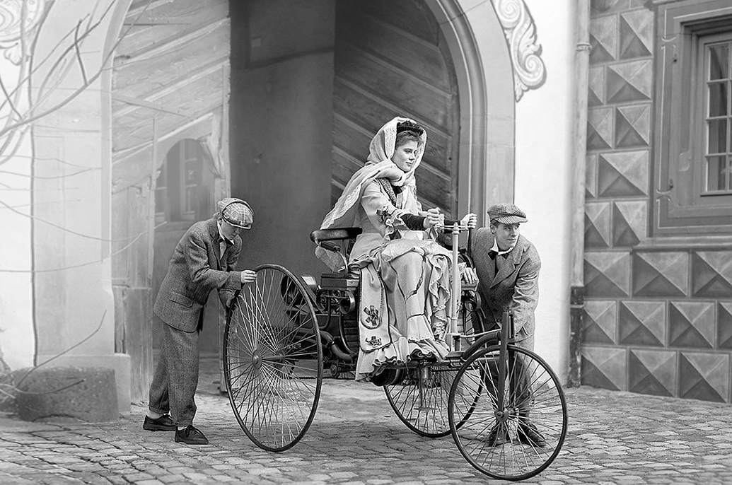 <p>We can’t help but start here in 1886, when <strong>Karl Benz</strong> (1844-1929) gave us what is generally acknowledged as the world’s first motor car. Powered by a single-cylinder 954cc engine, it managed around 10mph. He was helped by his wife <strong>Bertha</strong> (1849-1944, pictured in a modern re-creation); when she took it on the the world’s first long car journey in 1888, she fitted leather onto the brakes and thus invented <strong>the brakepad </strong>in the process.</p><p>She also stopped to refuel at a chemist, thus making it the <strong>world’s first (unwitting) petrol station</strong> in the process.</p><p><strong>GROUNDBREAKER SCORE: 11 - of course</strong></p>