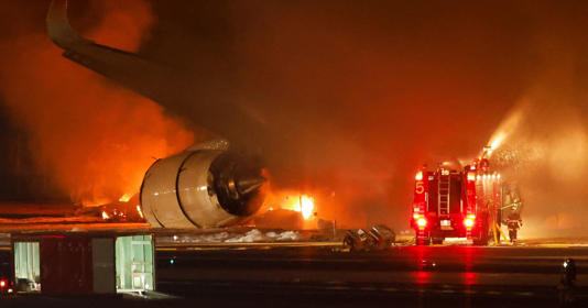 Japan Airlines' A350 airplane is on fire at Haneda international airport in Tokyo, Japan January 2, 2024. 
