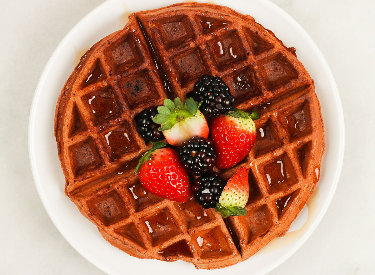 <p>"While most waffles are calorie bombs that would never be a part of any fat-burning eating plan, these spare the fat and calories and have all the makings of a satisfying breakfast," say The Nutrition Twins. "Eggs rank high on the satiety index scale (a rating of how filling foods are), and oats are packed with soluble fiber, providing long-lasting satisfaction and cholesterol-lowering benefits with their fiber. Plus, the combination of protein from Greek yogurt, milk protein powder, and egg makes this a recipe to keep you satisfied for hours. Step up the antioxidants and fiber by topping with berries."</p><p><strong>Get our recipe for <a rel="noopener noreferrer external nofollow" href="https://www.eatthis.com/protein-waffles-recipe/">Protein-Packed Waffles</a>.</strong></p>