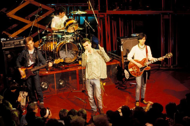 The Smiths performing live on the Tube. L-R: Andy Rourke, Mike Joyce (drums), Morrissey, Johnny Marr