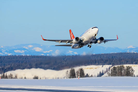 An Air North plane takes off in the Yukon. The company announced Wednesday it was cancelling scheduled winter flights between Yellowknife, Whitehorse, and Toronto.