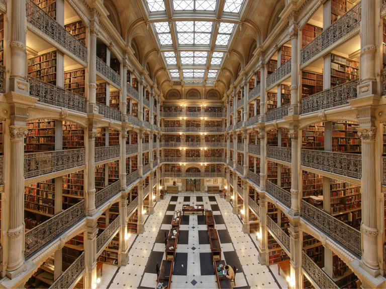 a library with many bookshelves